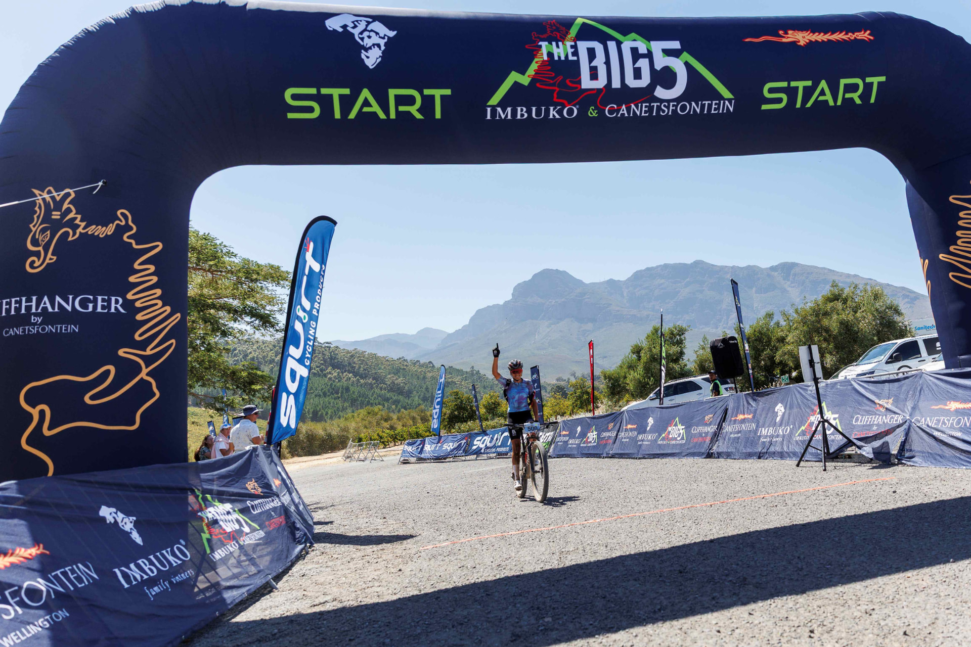Rider crossing the Big 5 finish line